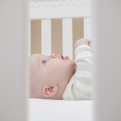 baby in cot