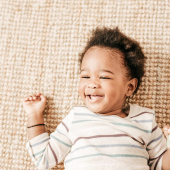 toddler lying down