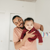 dad playing with baby