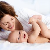 mum and baby lying down