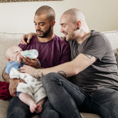 Dads feeding baby