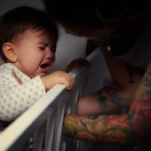 Baby crying in cot at night