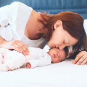 mum co-sleeping with baby