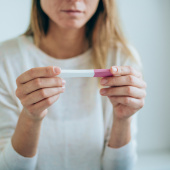 Parent with pregnancy test