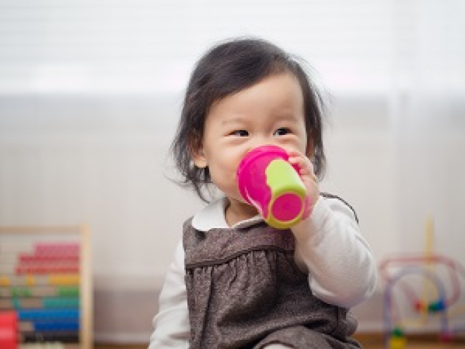 Toddler with a cup