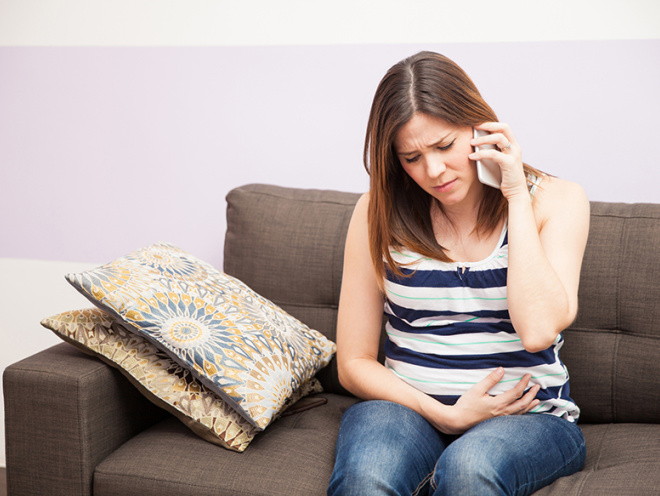 pregnant woman on phone