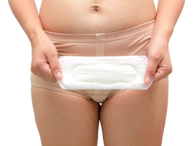 women with maternity pad