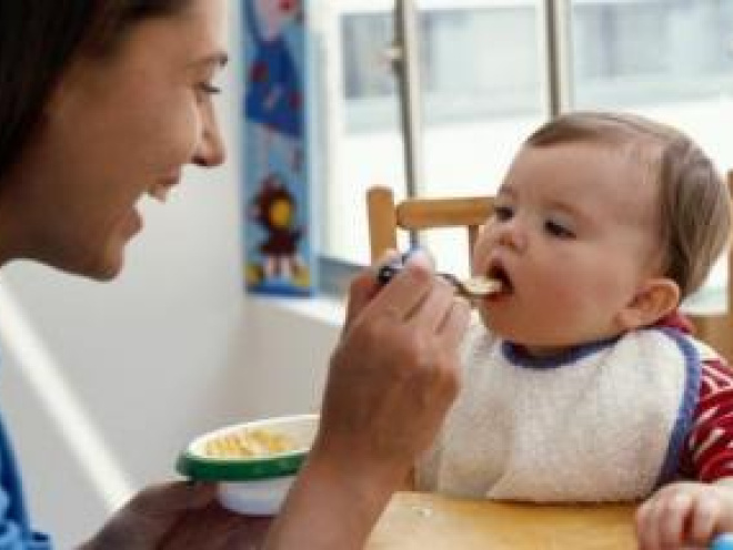 Feeding your baby solids early may help them sleep, study suggests