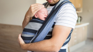 dad with baby in sling