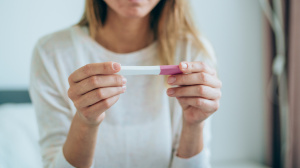 Parent with pregnancy test