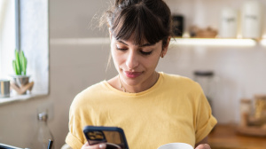 Young woman checking her phone